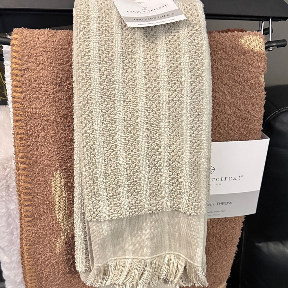 Cream room and retreat two hand towels